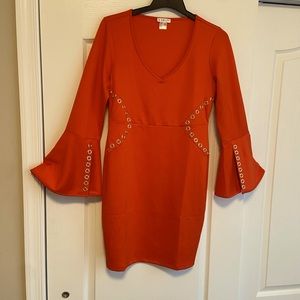 Beautiful grommet style dress with bell sleeves.